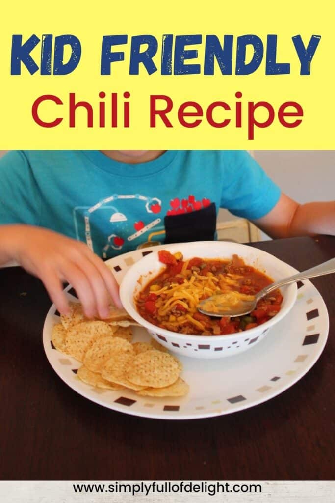 Kid Friendly Chili recipe (child shown eating chili with tortilla chips)