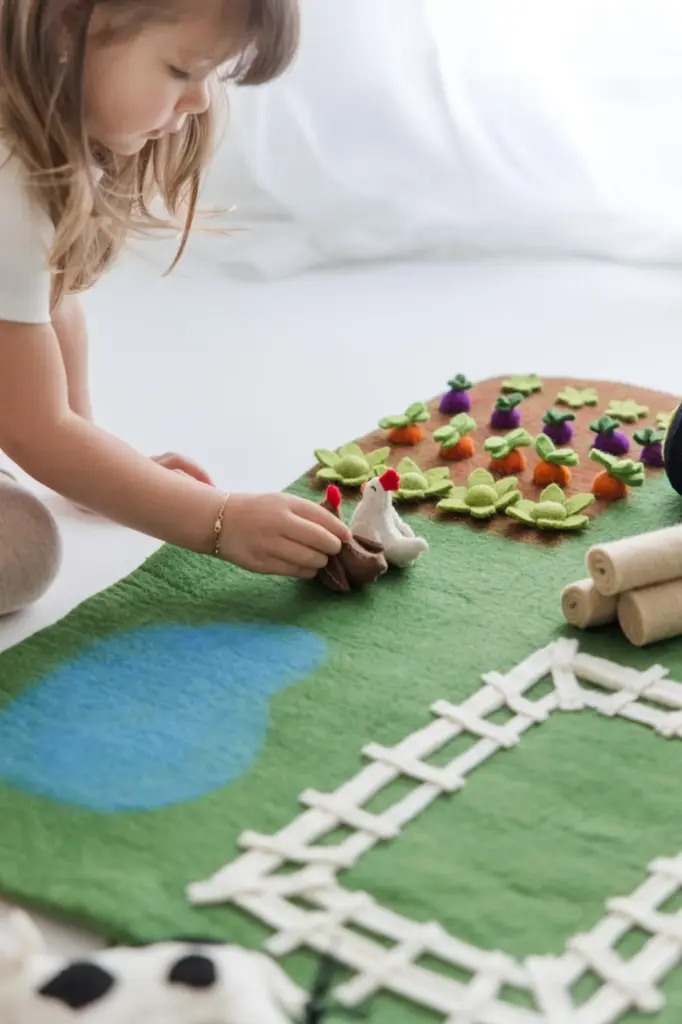 adorable Felt Play Mat is made by Nivas Collection on Etsy.