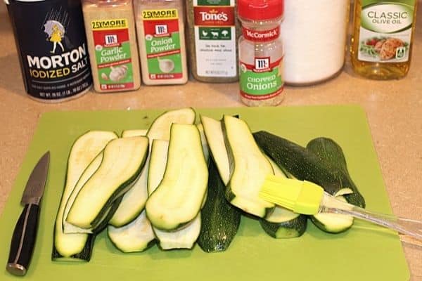 How to cut zucchini for grilling - cut them lengthwise 1/3 to 1/2 inch thick