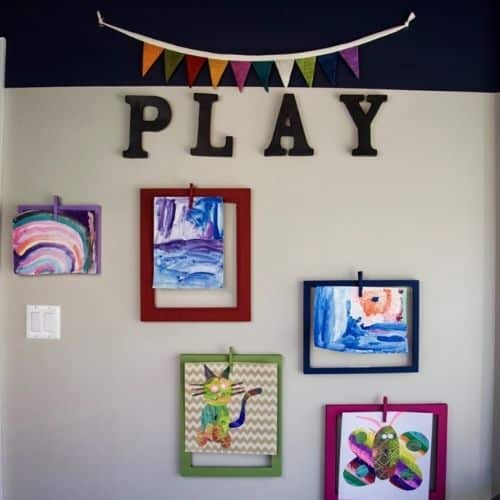 Kids art display wall by The organized mama