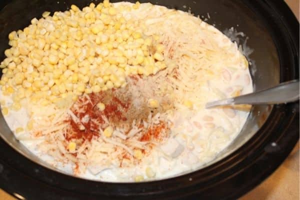 All of the ingredients for gluten free white chicken chili soup in the crockpot before cooking