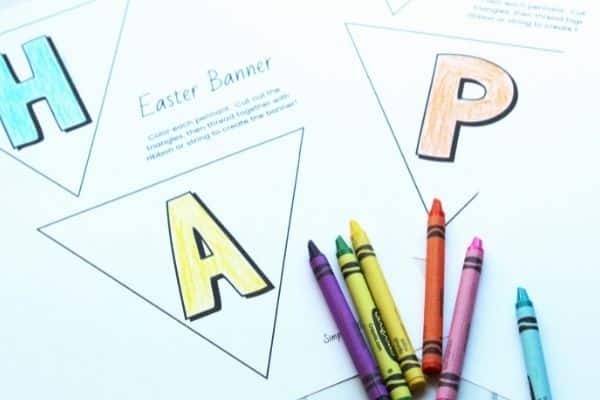 free Easter banner printable  colored in and an assortment of crayons