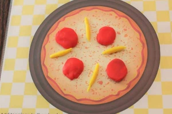 large group activities - preschool - pizza play dough mat with red dough pepperoni and yellow dough cheese