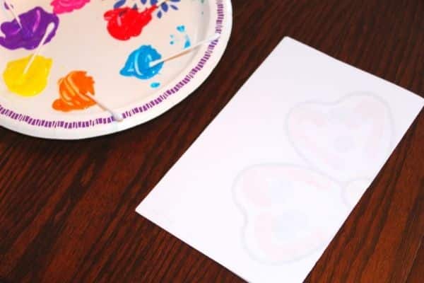 symmetry art for kids - paper folded over to make a symmetry print