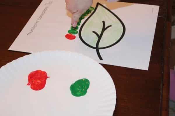 Thumbprint caterpillars being stamped