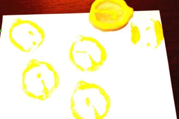 Yellow Lemon prints made with a lemon sliced lengthwise.