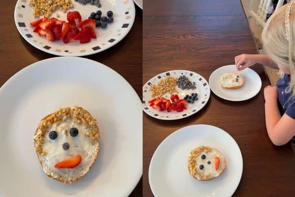 All about me snack activity - child decorating a bagel spread with cream cheese topped with fruit