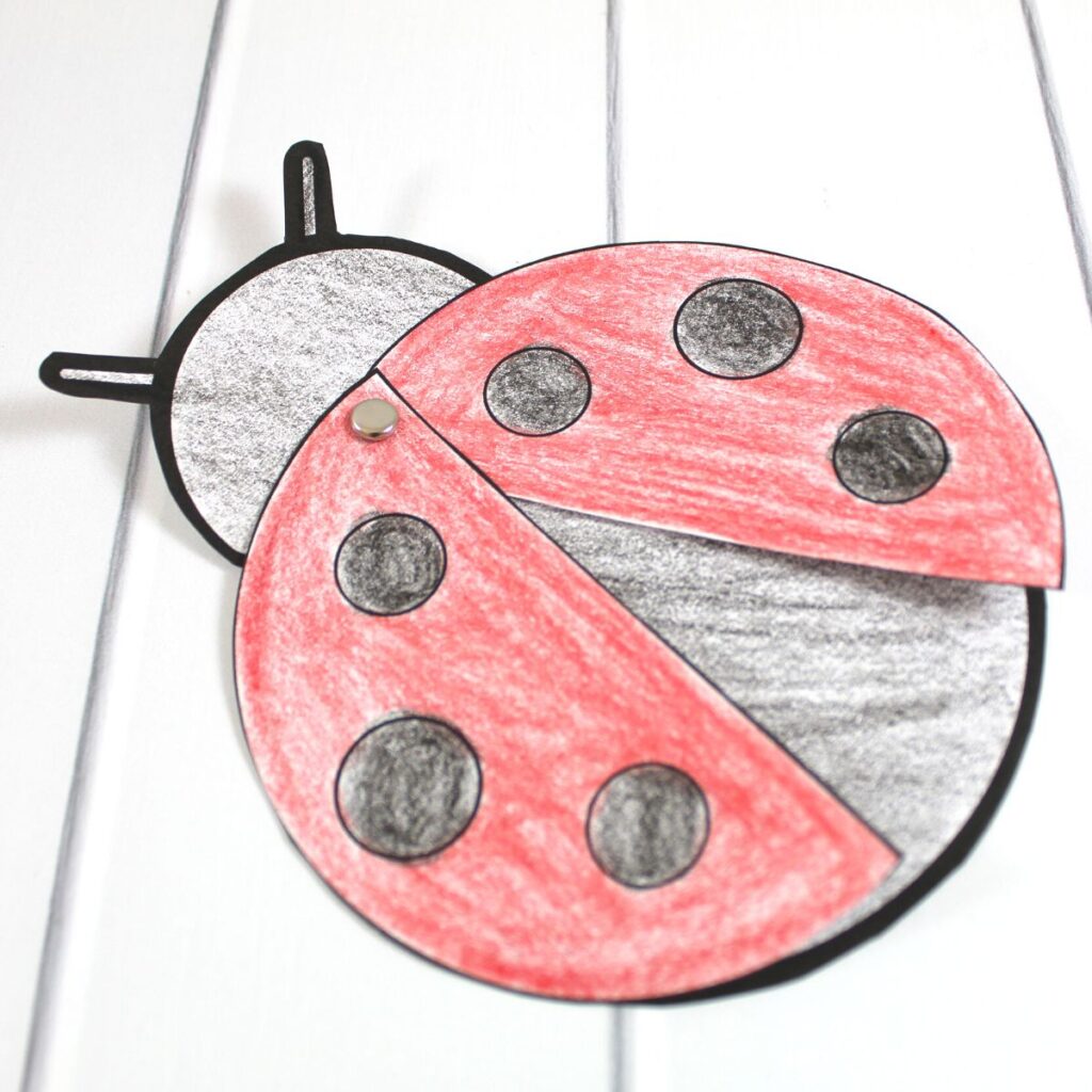 Ladybug paper craft assembled with a brad to make the wings move