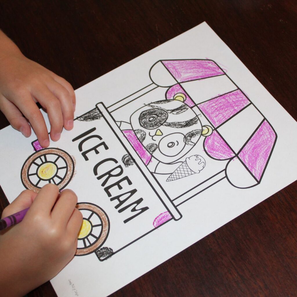 child coloring an ice cream cart coloring page - features a panda selling ice cream from a cart with awning.  free printable ice cream coloring sheet for kids