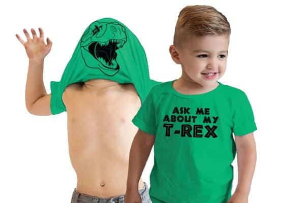 Ask Me About My T Rex T Shirt is by Crazy Dog T Shirts on Etsy  - child shown wearing green shirt that says Ask about my t-rex  and another photo of child with shirt lifted above his head with a t-rex on his head.