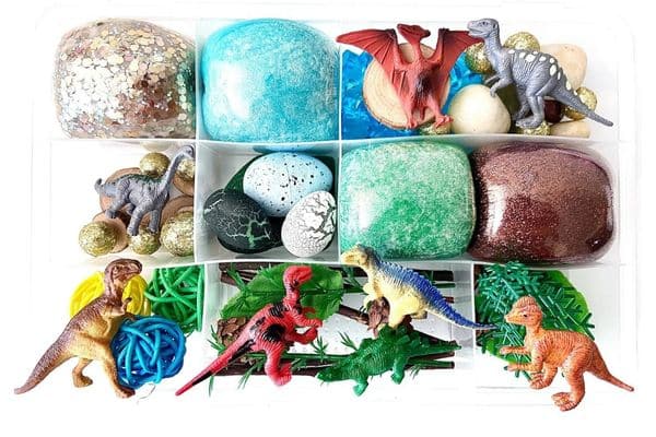 Dinosaur play dough kit by Happy Life Magic on Etsy - kit contains dinos, dinosaur eggs, plants, play dough 