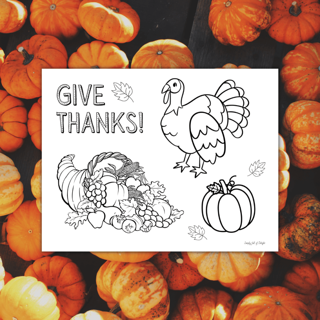 Give Thanks!  Free printable Thanksgiving Coloring page for kids - items on printable include a turkey, cornucopia, and pumpkin with words Give thanks!