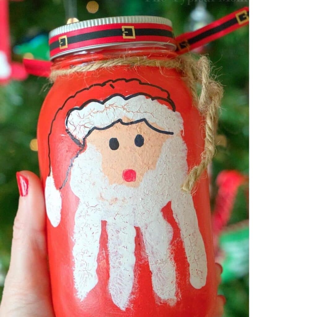 handprint Santa mason jar craft by The Typical Mom