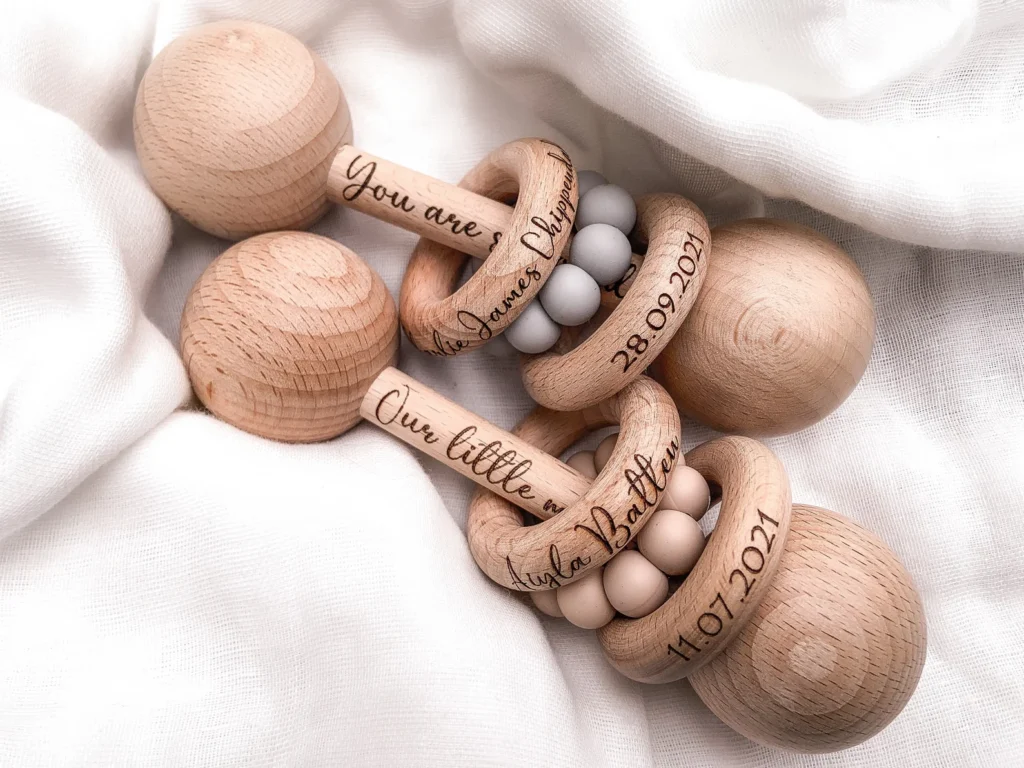 wooden baby rattle by New Line Gift