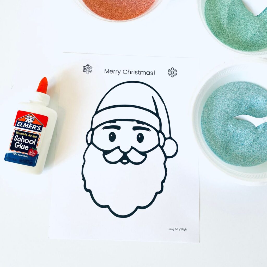 santa face printable shown with colored sand and glue