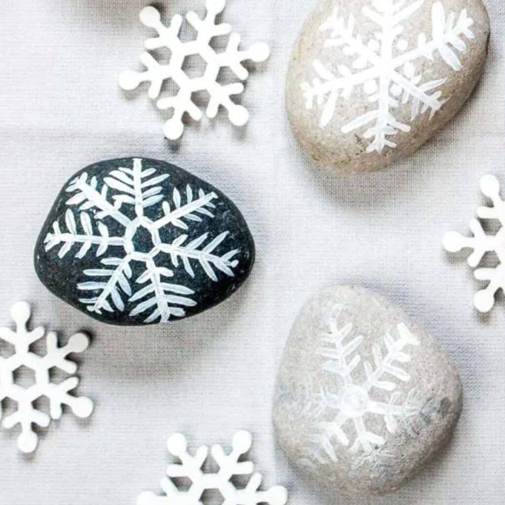 snowflake painted rock by Sustain my Craft Habit