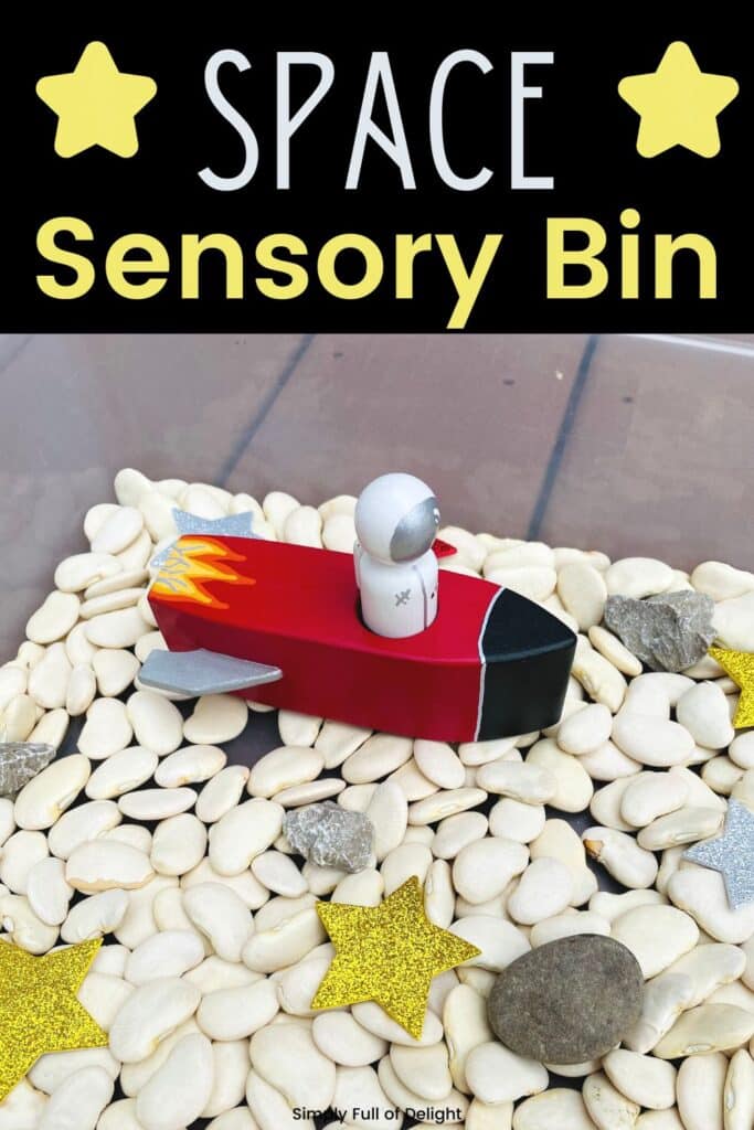 Space Sensory Bin - a fun space activity to teach preschoolers about astronauts, rockets and the solar system.  This space sensory play idea includes a wooden rocket, a wooden astronaut, stars, rocks, and lima beans