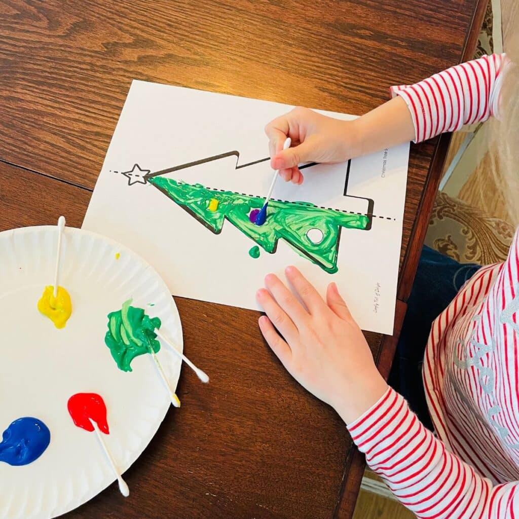 child painting symmetry Christmas tree craft for preschool