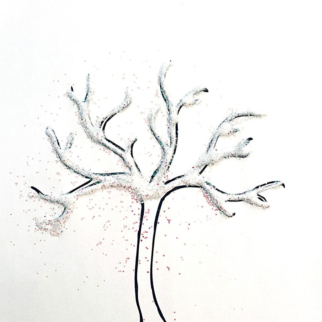 glitter winter tree craft - a free printable winter tree is traced in glue and then sprinkled with glitter