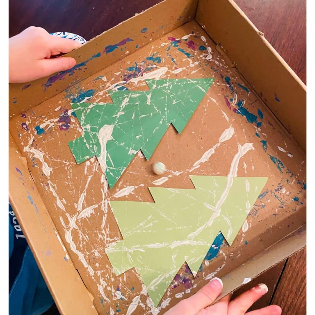 child marble painting a green tree set