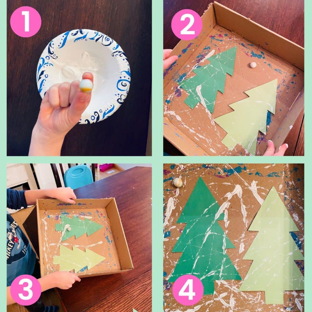 child holding marble over paint dish, child marble painting the tree, child tilting the box to make marble travel, and finished winter tree craft for kids