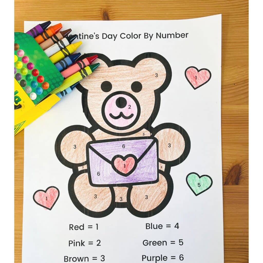 The bear valentine color by number shown colored in - free printable color by number teddy bear for Valentine's day