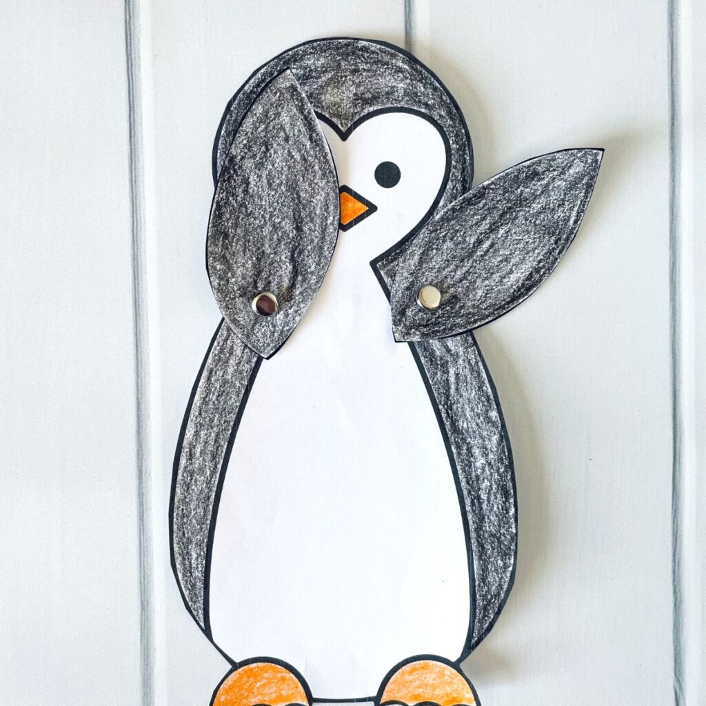 paper craft penguin playing peek a boo