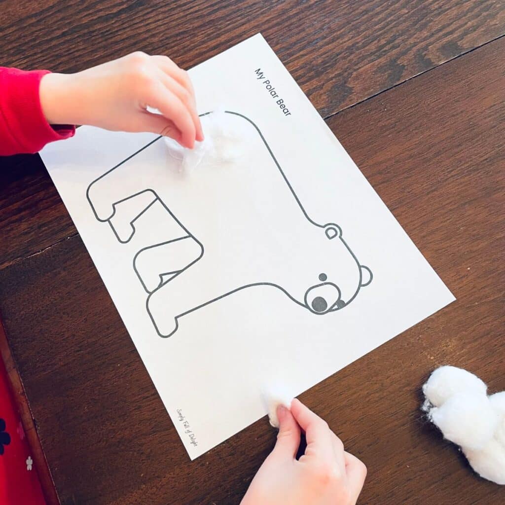 polar bear printable with cotton balls being added