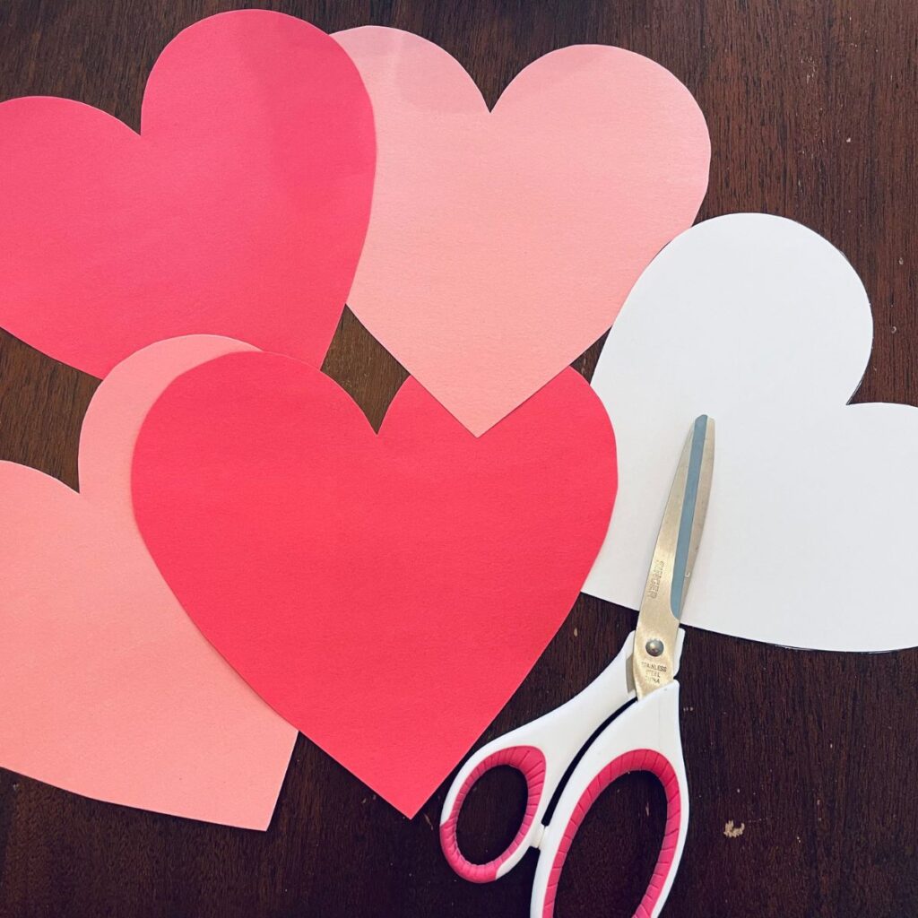 multiple hearts cut out for marble paint heart craft