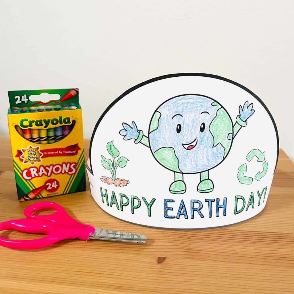 Earth day hat printable headband assembled next to scissors and crayons
