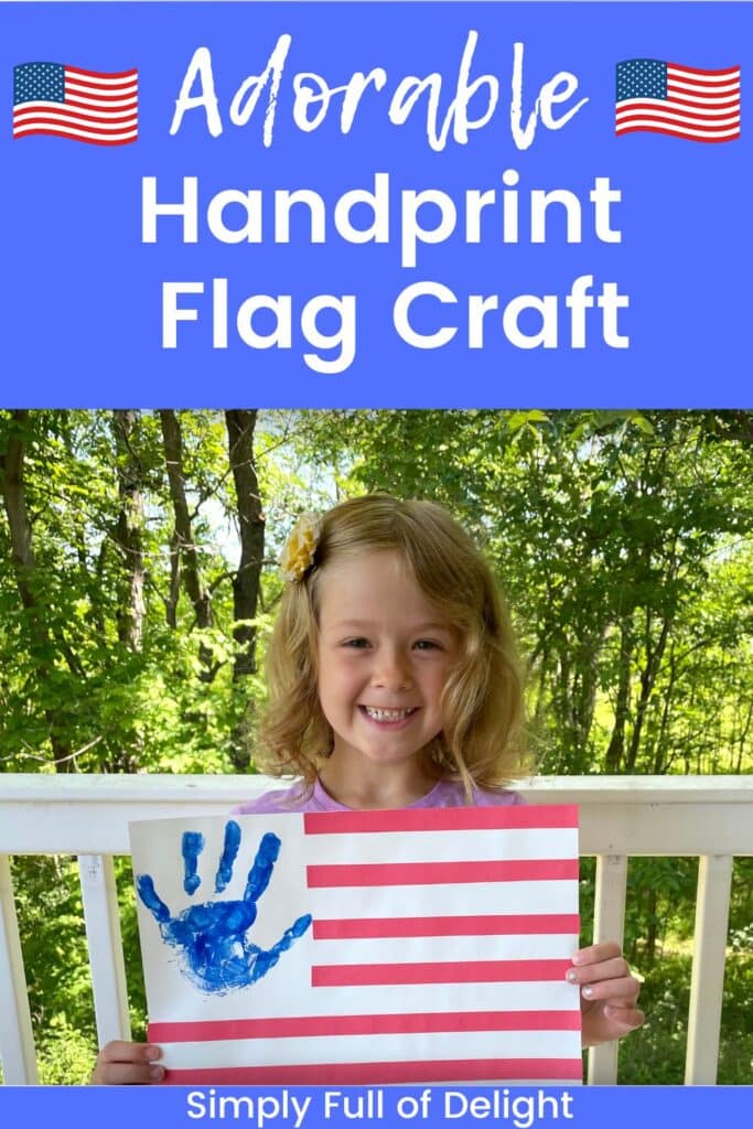 child holding the adorable handprint flag craft