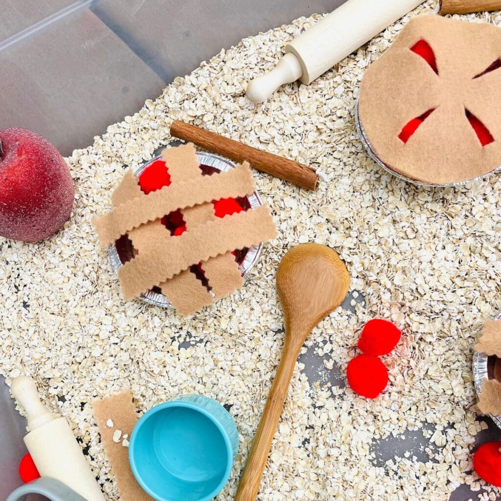 pie sensory play idea - felt pies, pom poms oats, rolling pin, scoops