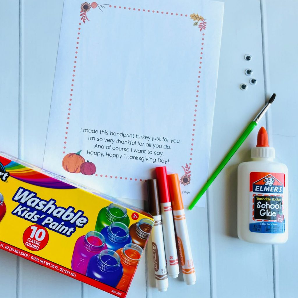 Supplies for Handprint Turkey poem craft - free printable poem, washable kids paint, markers, school glue, googly eyes, paint brush