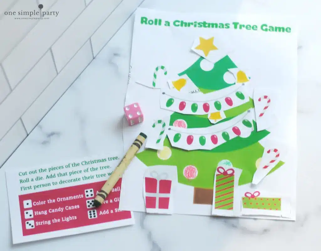 Free printable Roll a Christmas Tree Game by One Simple Party. 