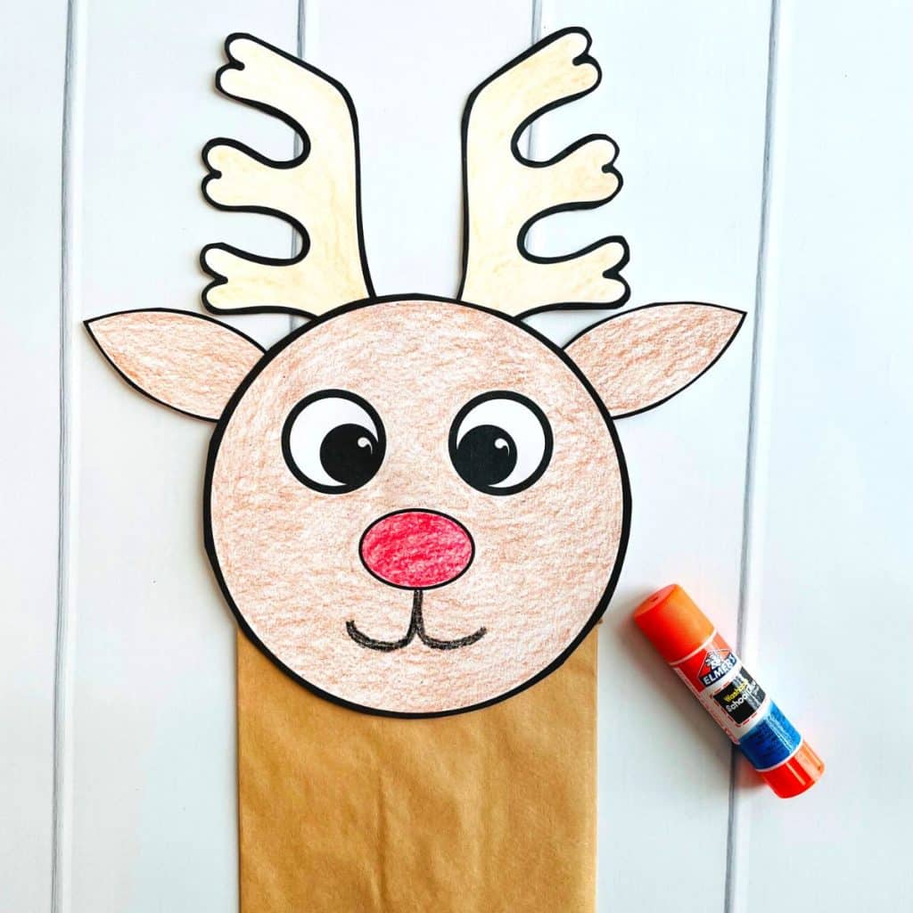 printable reindeer paper bag puppet with glue stick