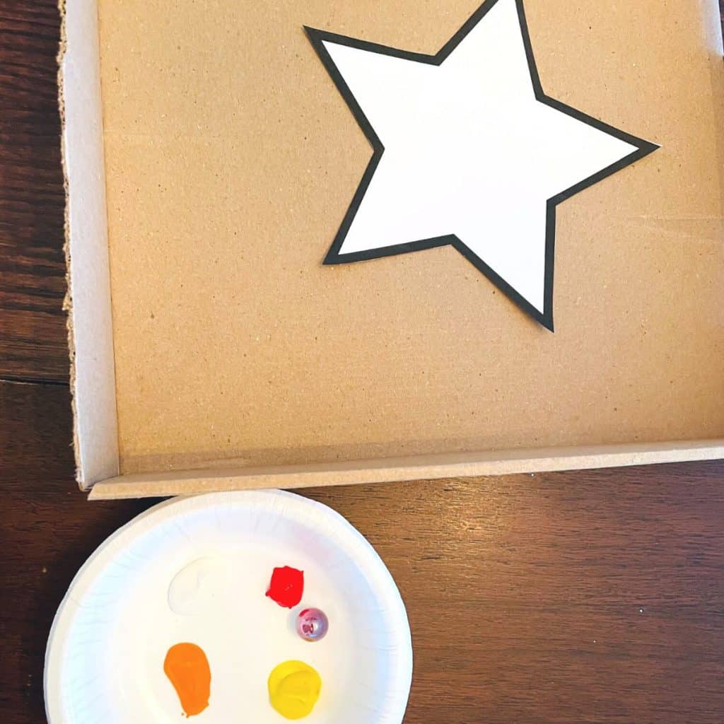 star template in a box with paint