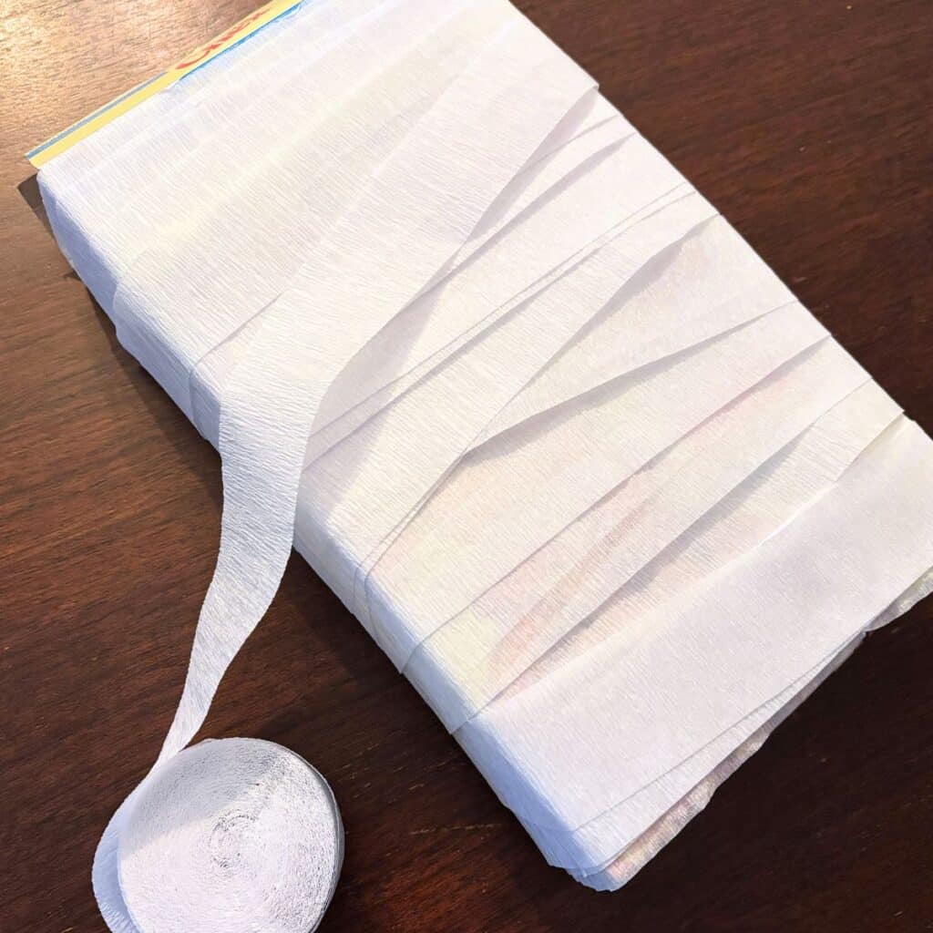 cereal box wrapped with white crepe paper