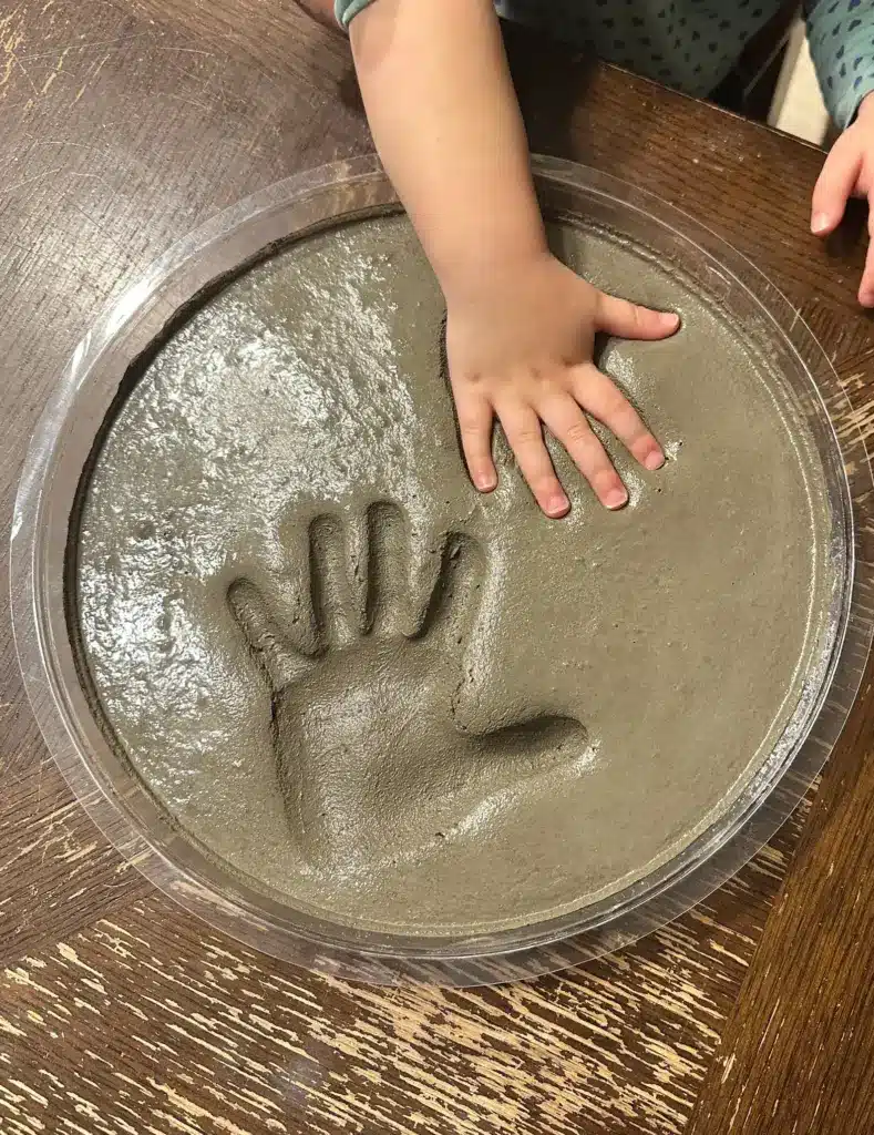 diy handprint garden stone by Mama B's Wreaths and DIY