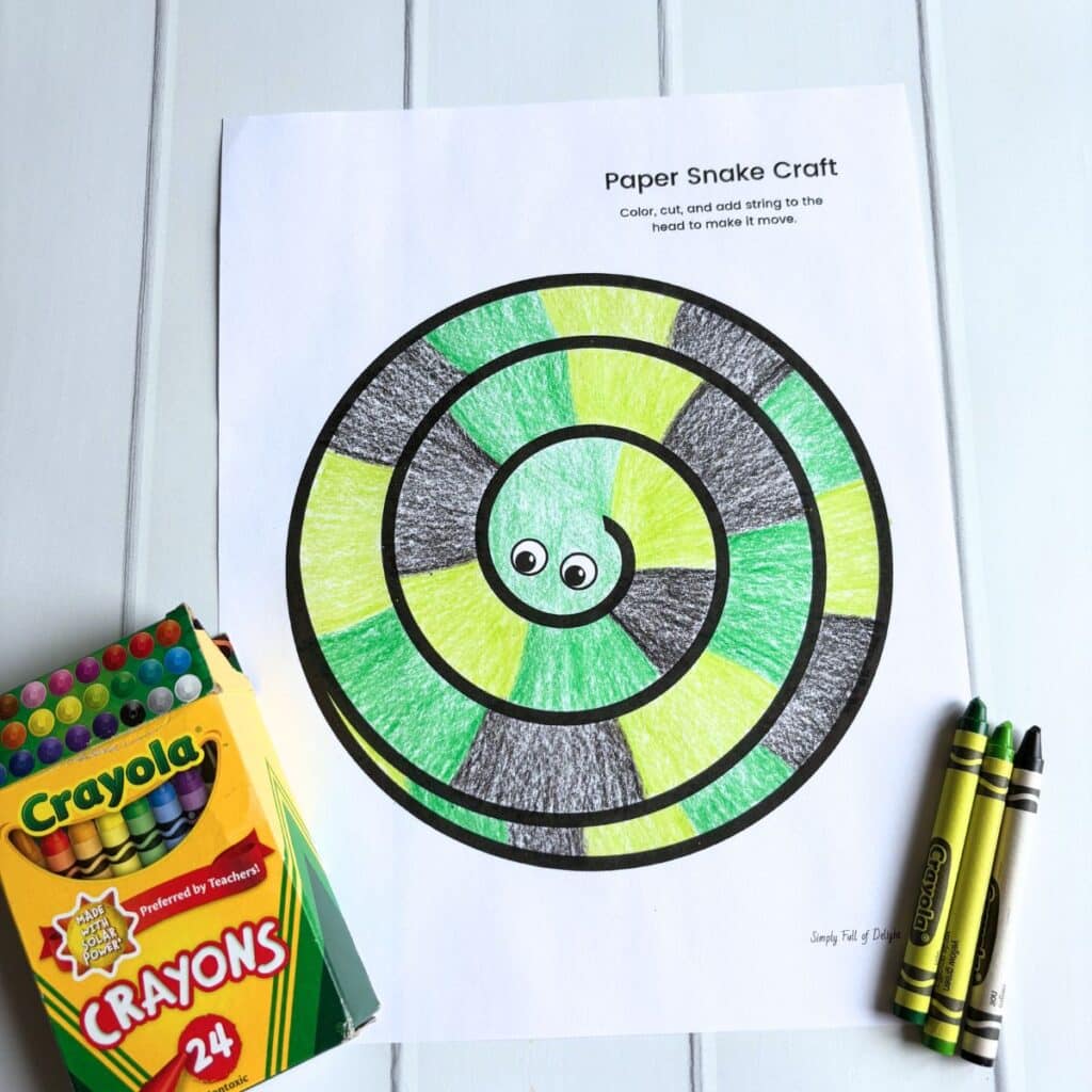 snake template colored with green, light green and black.