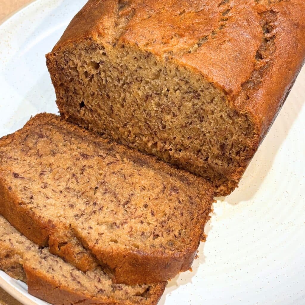 gluten free banana bread sliced on a plate