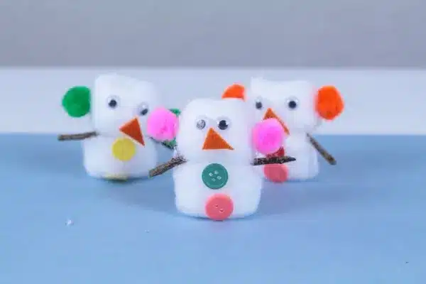 Easy Cotton Ball Snowman Craft for Kids is from Darcy and Brian